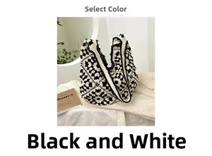 Close-up of black and white crochet knit pattern on an ethnic style tote bag