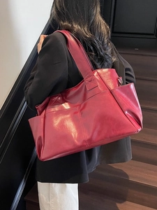 Elegant burgundy large capacity tote bag in glossy PU leather with wide shoulder strap