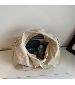 Large capacity tote bag showing spacious interior for tablet, umbrella and daily essentials