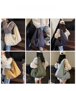 Detailed views of high-capacity tote bags in five solid colors showing nylon fabric texture