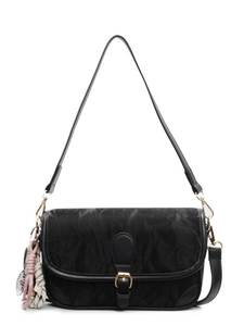 Fashionable black textured crossbody bag with gold buckle and woven charm on white background