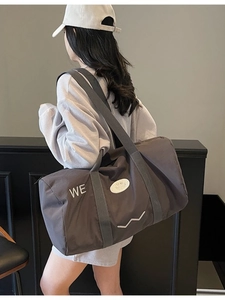 Borsa da viaggio capiente con ricamo WE e toppa smiley in colore carboncino scuro