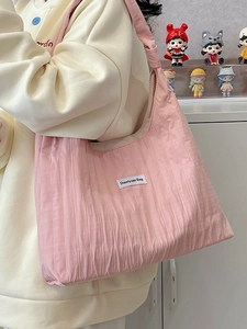 Pink pleated nylon tote bag with knot handle and large capacity for casual shoulder wear