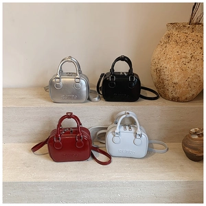 Retro style mini doctor bags in silver, black, burgundy, and grey with RETRO embossing