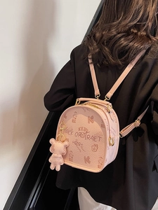 Chic pink PU leather mini backpack featuring cartoon bear prints and gold hardware