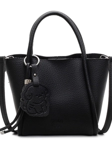 Sac à main minimaliste en cuir grainé noir avec breloque chien et bandoulière amovible