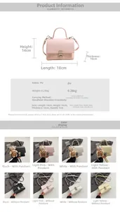 Detail view of stylish trapezoid PU leather handbag with metallic snap lock and bear charm