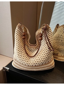 Minimalist beige woven shoulder bag with large capacity and vintage beaded straps