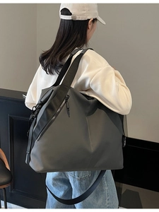 Minimalist large capacity dark grey nylon tote bag for travel and daily commute