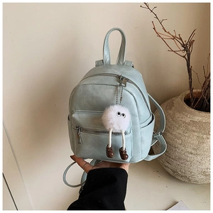 Mini mint blue PU leather backpack with front zipper pocket and cute plush charm detail