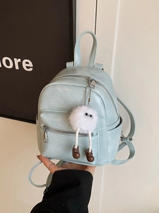 Chic mint blue mini PU leather backpack with a cute fuzzy charm for daily travel