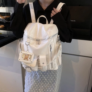 White glossy PU backpack with multiple functional pockets and cute bear pendant charm