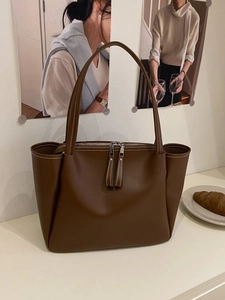 Retro brown leather tote bag with white contrast stitching and double zipper design