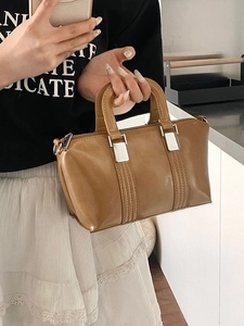 Elegant brown PU leather Boston handbag with silver hardware and versatile top handles