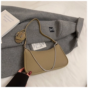 Close-up of khaki mesh hobo bag with silver chain strap and extra shoulder strap