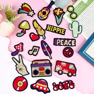 Detailed set of 18 hippie style embroidered DIY patches including guitars and flowers