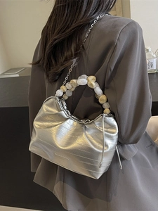 Silver pleated dumpling bag with marble bead handle and metal chain shoulder strap