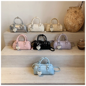 Boston handbags collection in seven colors with pearl heart charms and shoulder straps