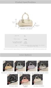 Detail view of mini PU leather bowling bag with detachable strap and pearl heart charm