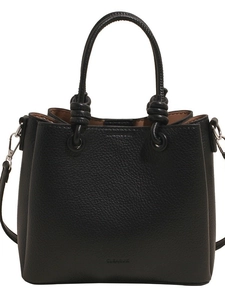 Minimalist black pebble leather bucket bag with knotted handles and crossbody strap