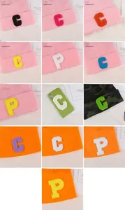 Detail of chenille letter patches showing dimensions and vibrant towel embroidery texture