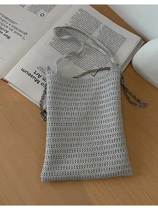 Silver woven crossbody bag with metal chain on magazine, minimalist beach style