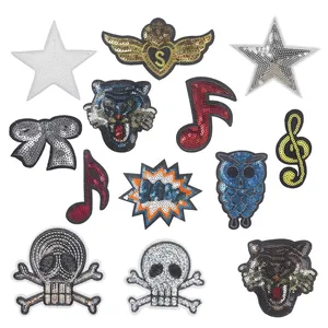 Set of shiny sequin embroidery patches with tiger, skull, and star designs for DIY clothing