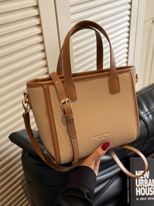 Chic woven tote bag with brown faux leather trim and adjustable strap for women