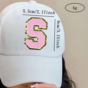 Self-adhesive pink chenille letter S patch on a white baseball cap, 8x5.5cm size detail