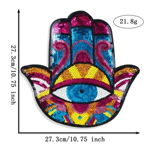 Macro view of large Hamsa hand sequin embroidery patch with dimensions 27.3cm x 27.3cm