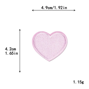 Pink heart embroidered patch for DIY clothing decoration measuring 4.9cm by 4.2cm