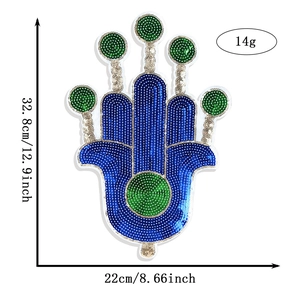 Detail view of large Hamsa Hand sequin patch with 32.8cm height and 22cm width dimensions