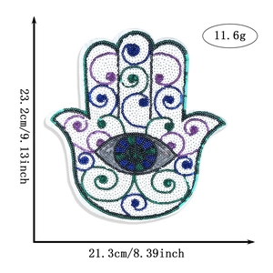 Detailed close-up of Hamsa hand sequin embroidery patch with evil eye design and dimensions