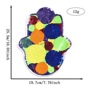 Detail view of large Hamsa hand sequin patch with dimensions 25.5cm by 19.7cm