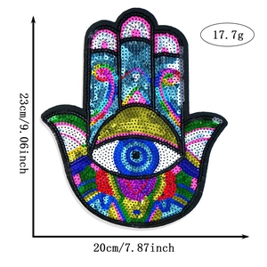 Detailed view of Hamsa Hand sequin patch with evil eye design, 23x20cm DIY decor