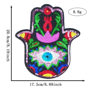 Detailed view of Hamsa hand sequin patch with dimensions and colorful embroidery