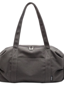 Durable dark grey canvas travel bag with large capacity and sturdy handles on white background