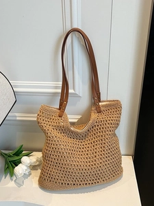 Bolso tote grande de algodón trenzado con asas de cuero y textura de red hueca