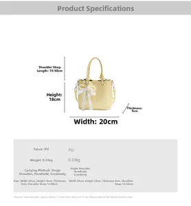 Diagramme de dimensions de sac seau jaune avec perles et nœud décoratif en dentelle