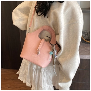 Pink lychee texture leather bucket bag with silver lock and detachable strap