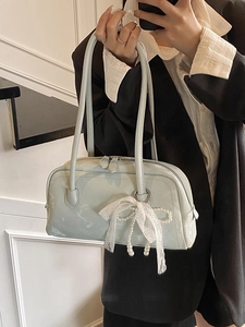 Light blue faux leather shoulder bag with lace bow and pearl charm for casual commuting