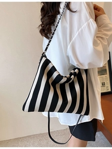 Chic black and white striped canvas tote bag with chain strap and large capacity