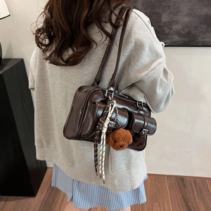 Deep brown glossy patent PU pillow bag for women with cute plush bear pendant accessory