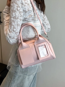 Borsa a bauletto rosa lucida in ecopelle con doppio manico e tracolla staccabile