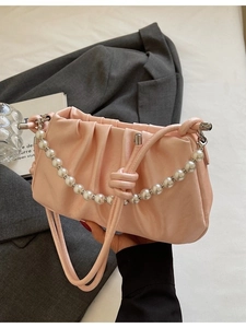 Pink ruched cloud bag with pearl chain and knotted shoulder strap in French vintage style