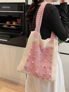 Knitted hollow tote bag with colored pearls and pink-beige contrast texture