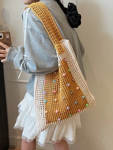 Handmade crochet shoulder bag with colorful beads and knit hollow grid pattern