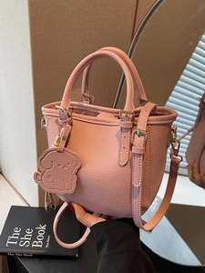Women Lychee Texture PU Leather Bucket Bag Minimalist Crossbody Shoulder Bag With Cartoon Charm Golden Hardware Small Handbag