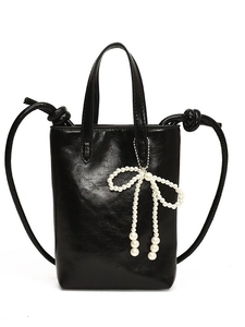 Sac seau noir brillant avec pendentif nœud en perles et fine bandoulière pour femme