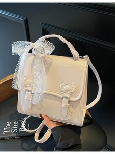 Cream vintage patent leather backpack with lace bow and metal buckles for women